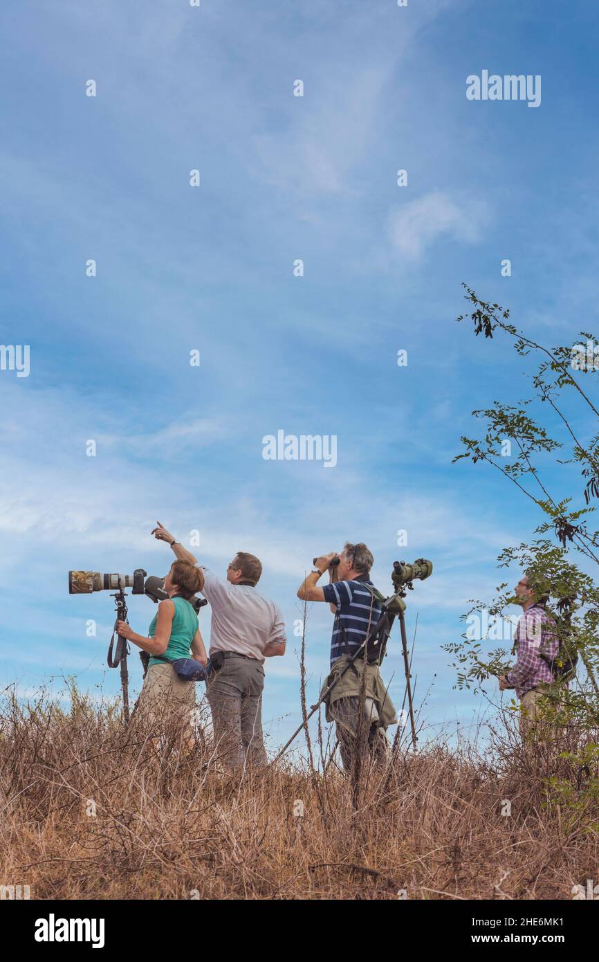 Birdwatchers with their equipment at the mouth of the Rio Guadalhorce, Malaga, Malaga Province, Andalusia, southern Spain. Stock Photo