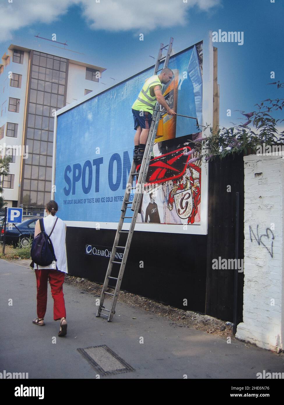 Display Advertising board being rebranded with new advert Stock Photo