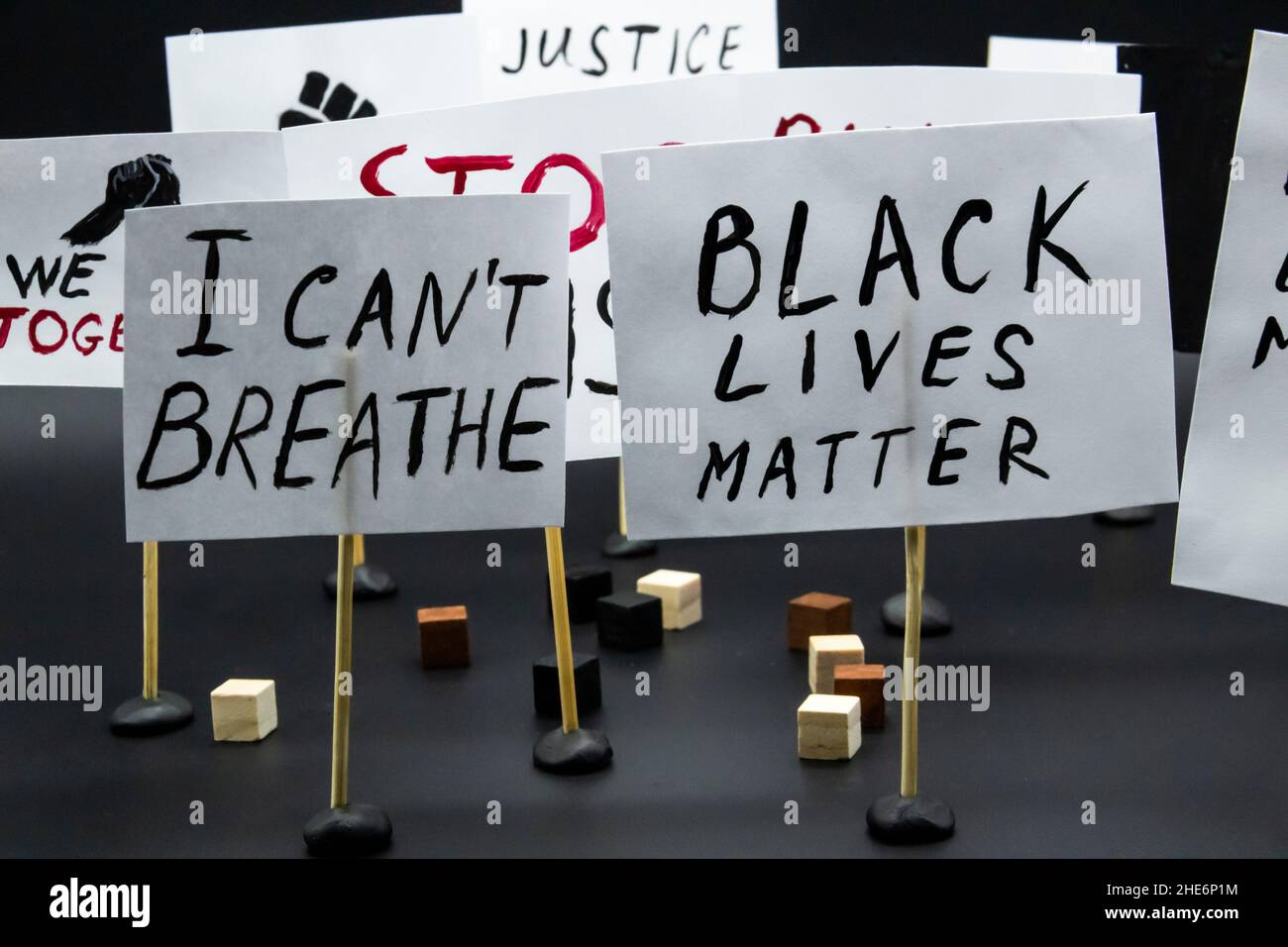 Concept of protest, rally, demonstration. Posters with words 'Black lives Matter', 'I can not breathe', 'Rules are for everyone' Stock Photo