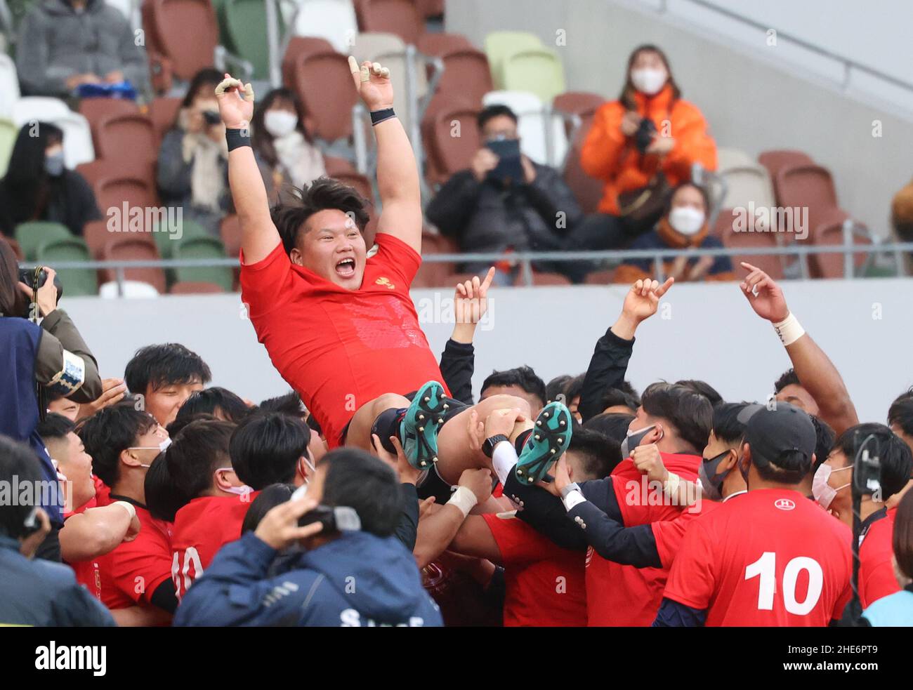 Tokyo, Japan. 9th Jan, 2022. Teikyo University rugby team captain Kotaro Hosoki is tossed up in the air by team members as they celebrate their victory of the Japan University Rugby Championship at the national stadium in Tokyo on Sunday, January 9, 2022. Teikyo University defeated Meiji University 27-14 in the final. Credit: Yoshio Tsunoda/AFLO/Alamy Live News Stock Photo