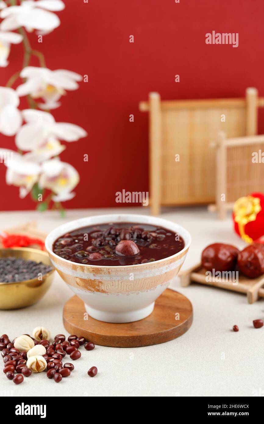 Laba Porridge Eight Treasure Congee, Traditional Chinese Dish Served at Laba Festival, Chinese Red Concept Stock Photo