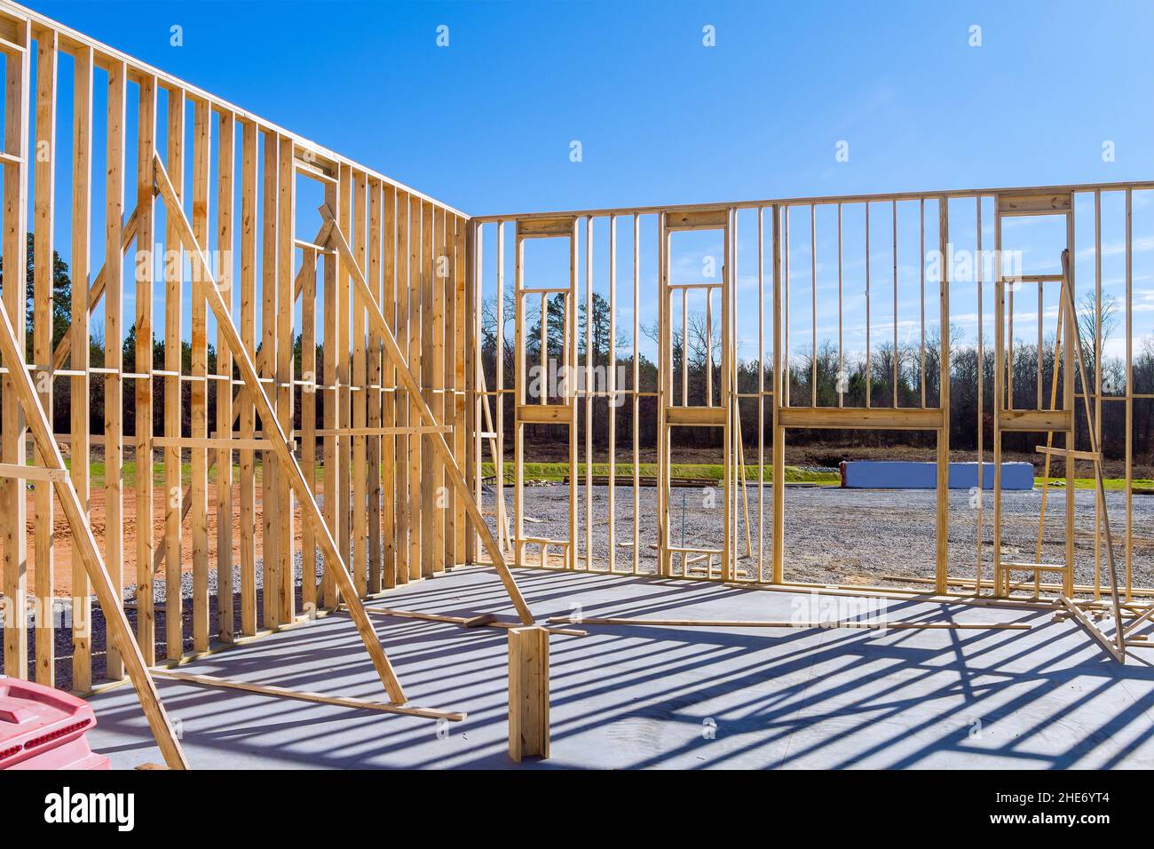 Fragment of a new home under construction wood framing beams Stock Photo