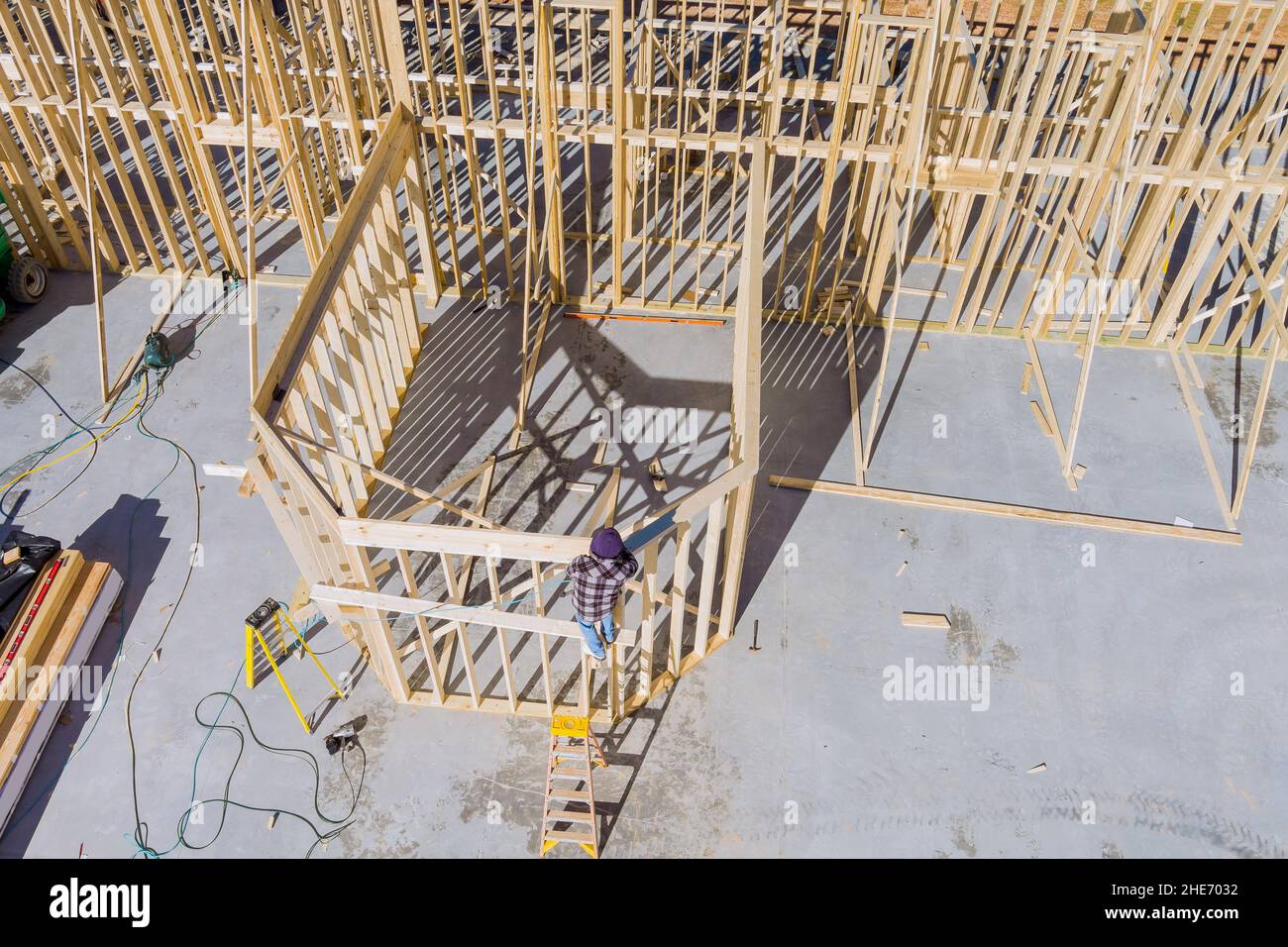 Aerial view the a new house under construction wood framing beams Stock Photo