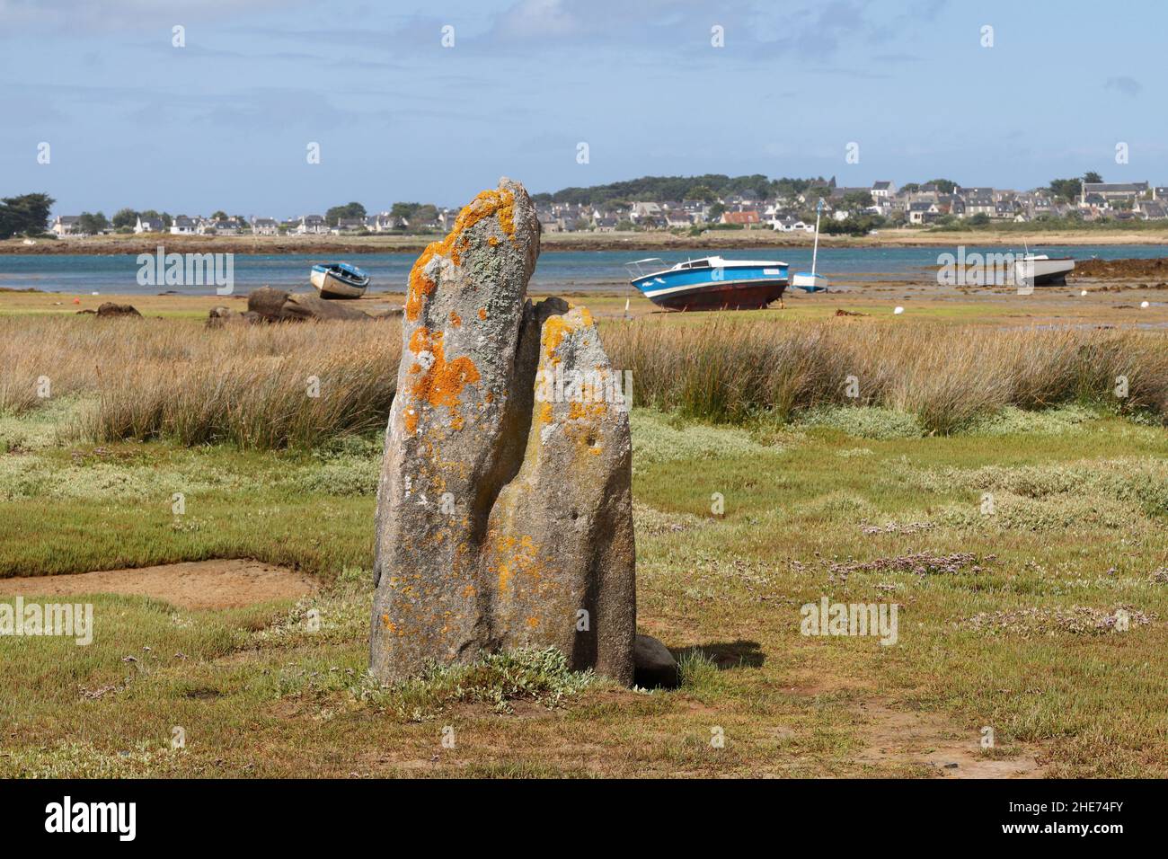 Menhir of Toeno - megalithic monument - lonely menhir on the coast at Trebeurden in Brittany, France Stock Photo