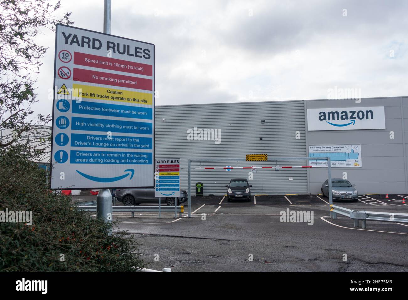 Amazon warehouse with yard rules board Stock Photo Alamy