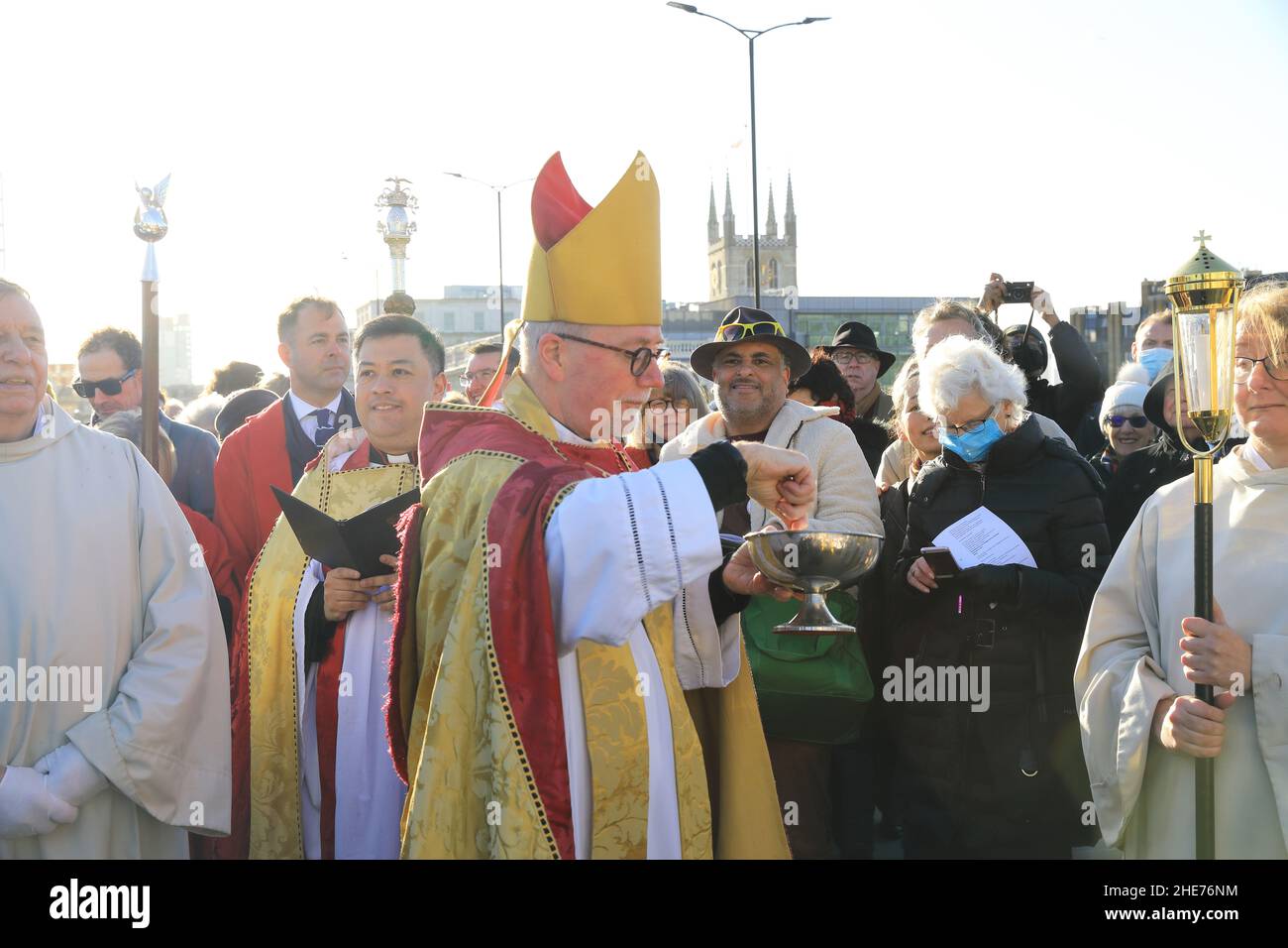 London, UK, January 9th 2022. The Bishop of Southwark Cathedral joined clergy and congregation from St Magnus the Martyr church in a service blessing the Thames and all those who use London's great river. This year they were lucky to have beautiful sunny weather. Monica Wells/Alamy Live News Stock Photo