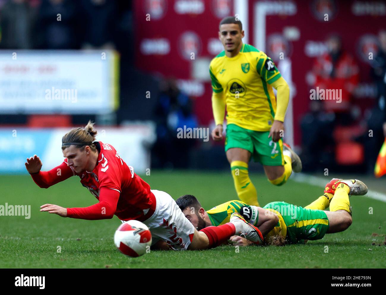 Charlton Athletic's Joshua Davison (left) is fouled by Norwich City's Grant Hanley during the Emirates FA Cup third round match at The Valley, London. Picture date: Sunday January 9, 2022. Stock Photo
