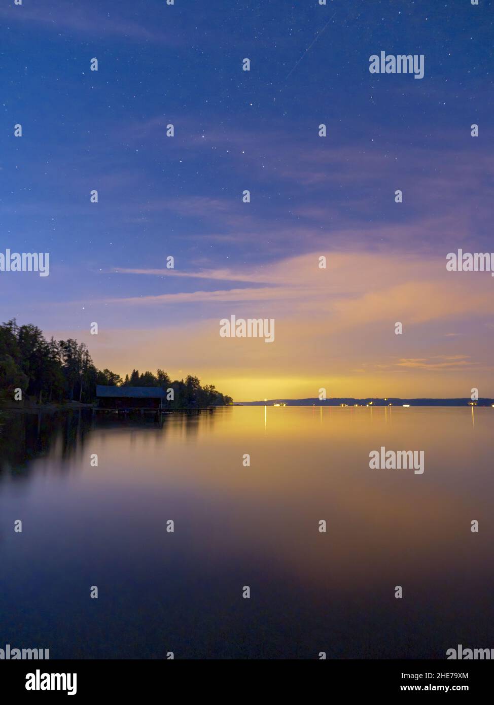 Starry sky at the lake, Bavaria, Germany Stock Photo