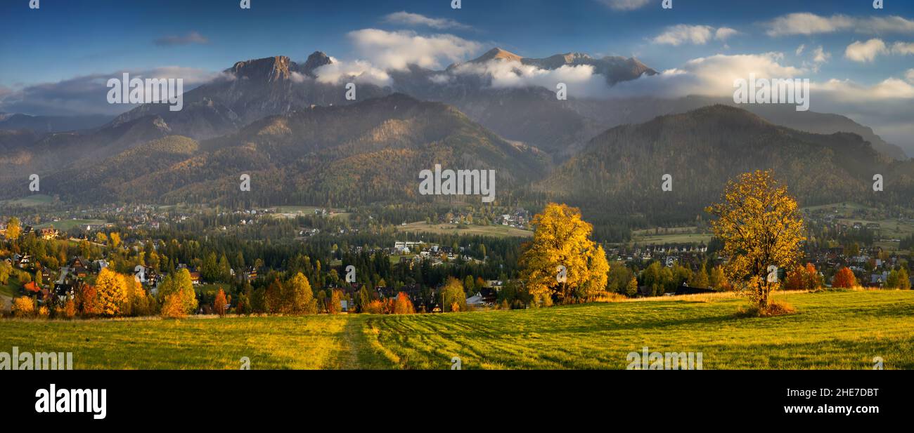 Panorama of West Tatra Mountains and Koscielisko village in autumn, Poland Stock Photo