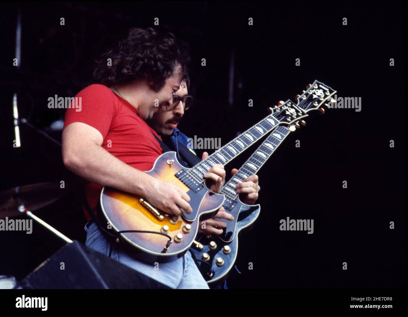 English guitarists Bernie Marsden and Micky Moody performing at the 1977 Reading Festival, England. Stock Photo