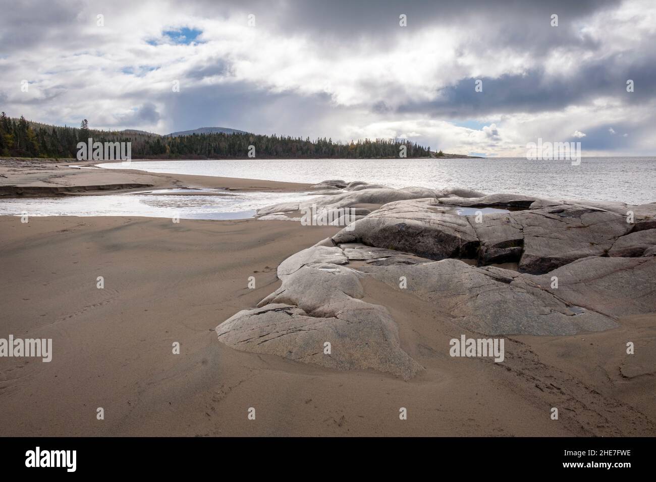 Beach at Neys Provincial Park on the shore of Lake Superior in Northwestern Ontario, Canada featuring granite sculpted by glaciers. Stock Photo