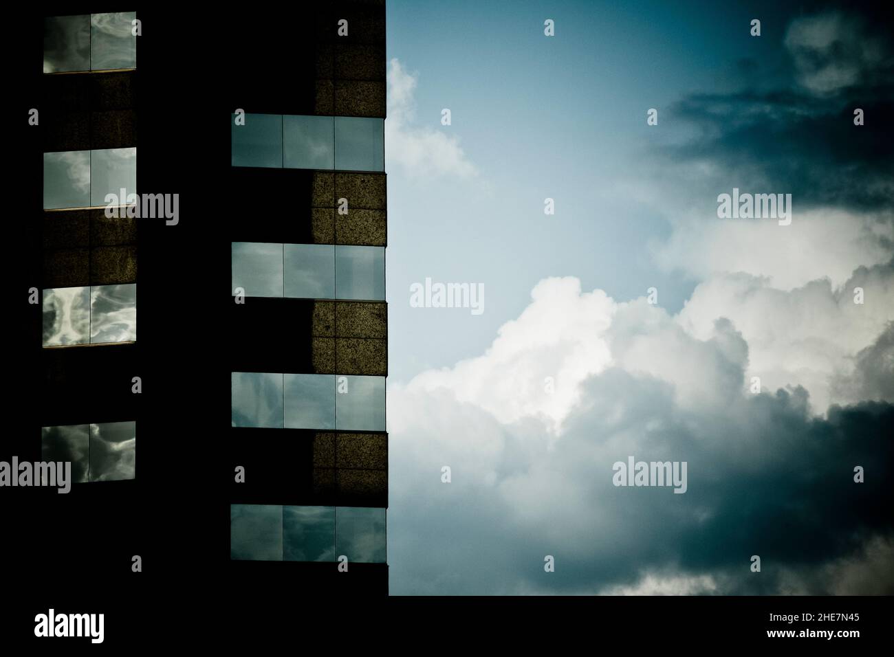 Detail of an office building and sky with clouds Stock Photo - Alamy