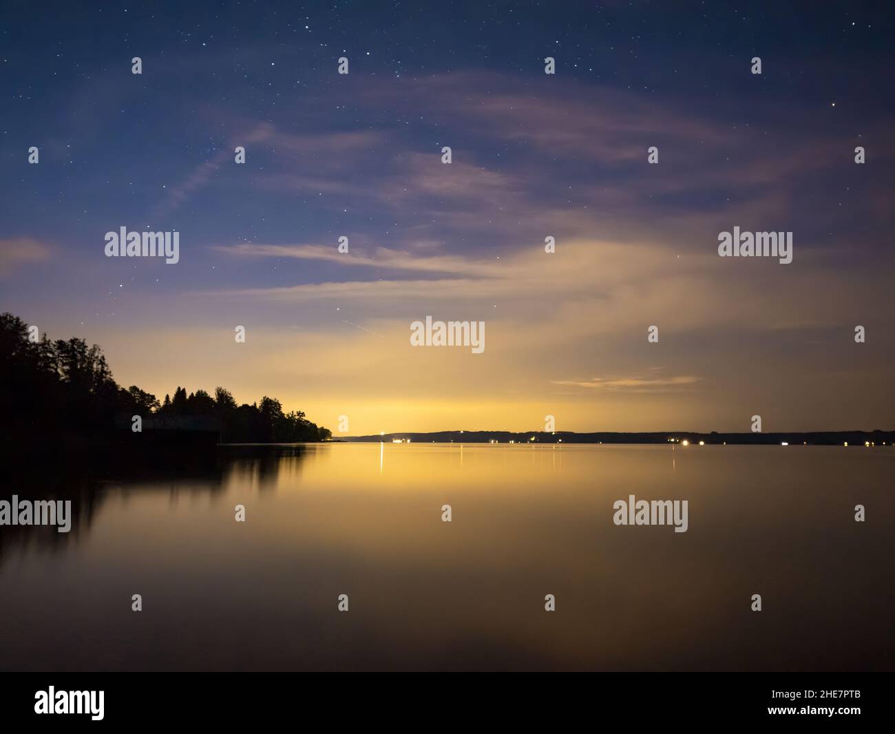Starry sky at the lake, Bavaria, Germany Stock Photo