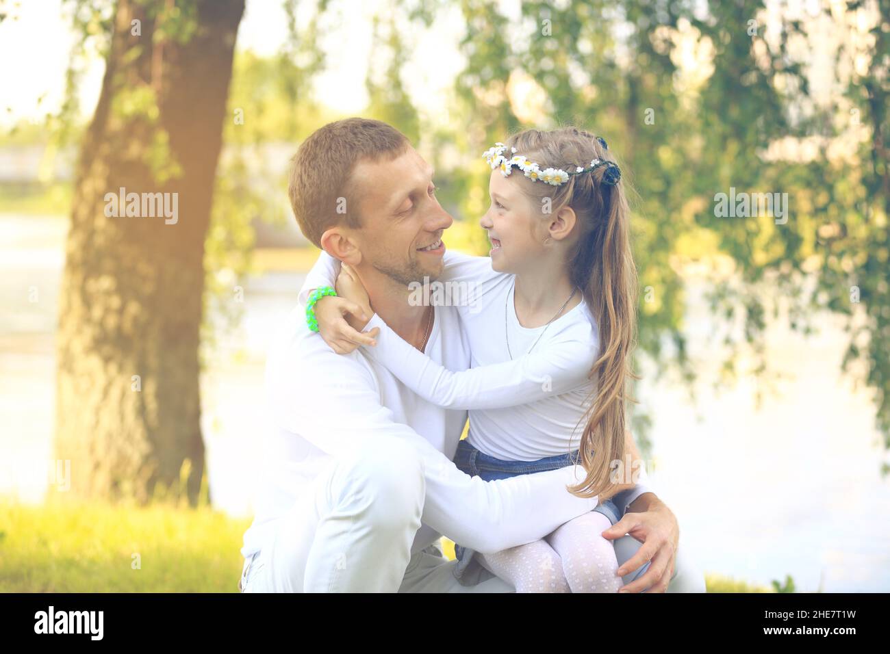 Happy father with daughter in summer park Stock Photo - Alamy