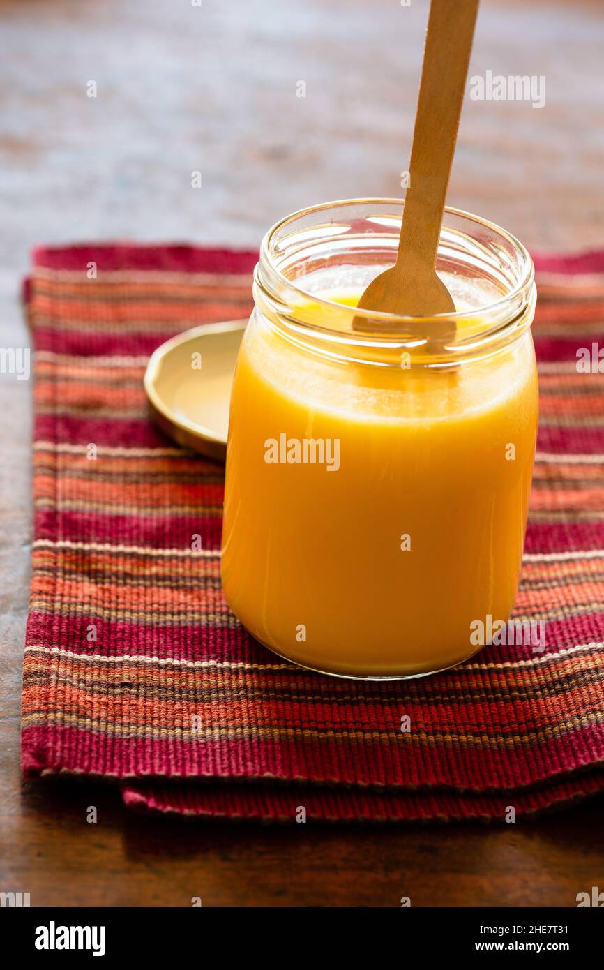 Ghee clarified butter in a glass jar Stock Photo Alamy