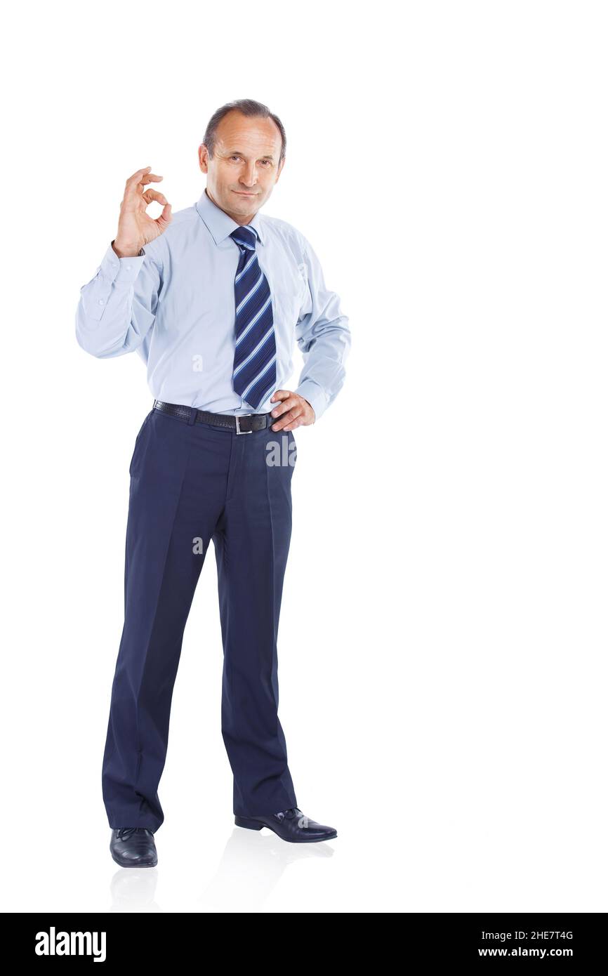 confident businessman showing hand sign of success. photo on white ...