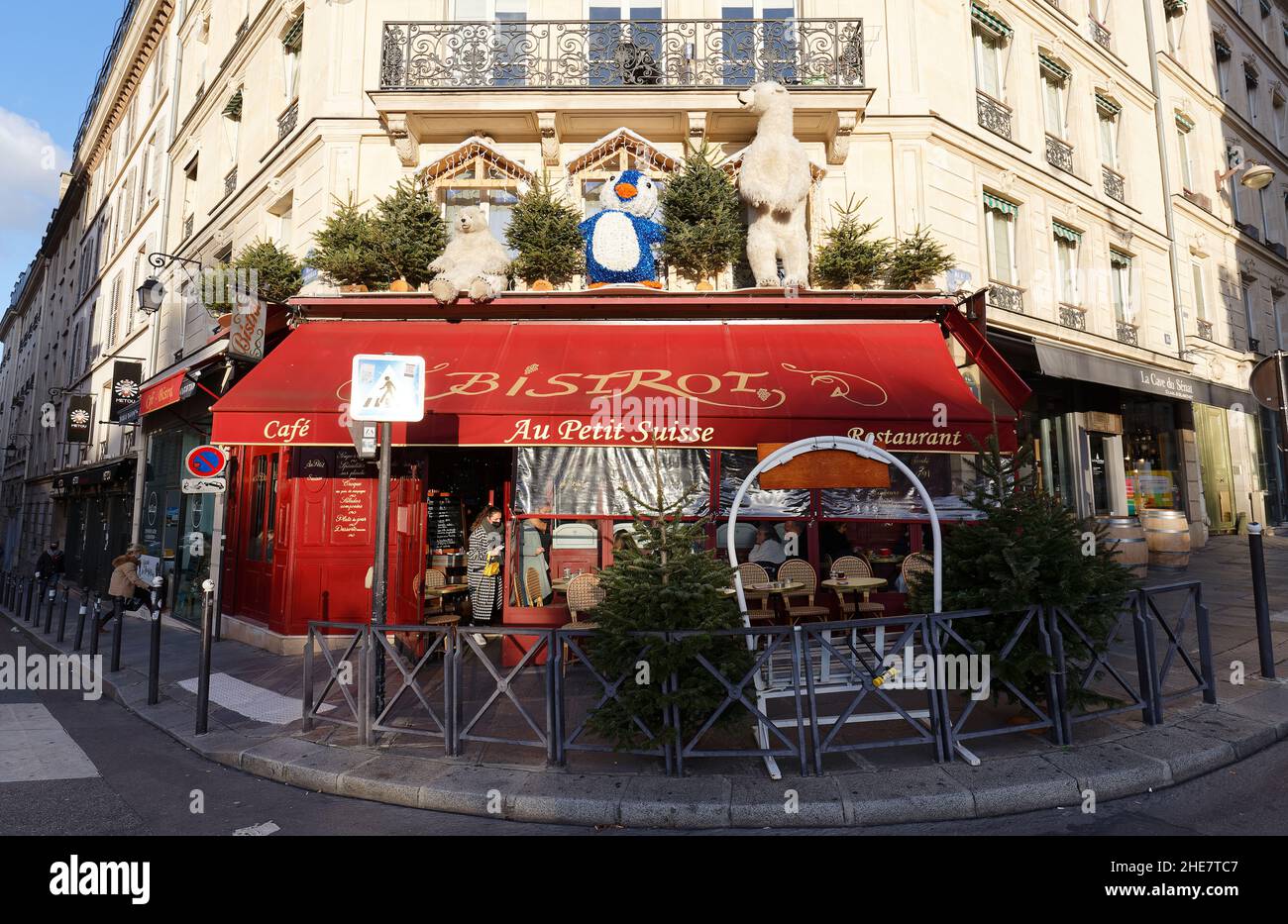 The traditional French cafe Au Petit Suisse decorated for Christmas 2021 . It located near Luxembourg garden in Paris, France. Stock Photo
