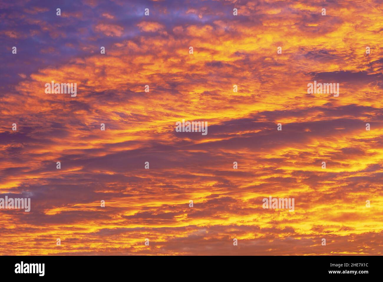 Cloudy sky at sunset, afterglow Stock Photo