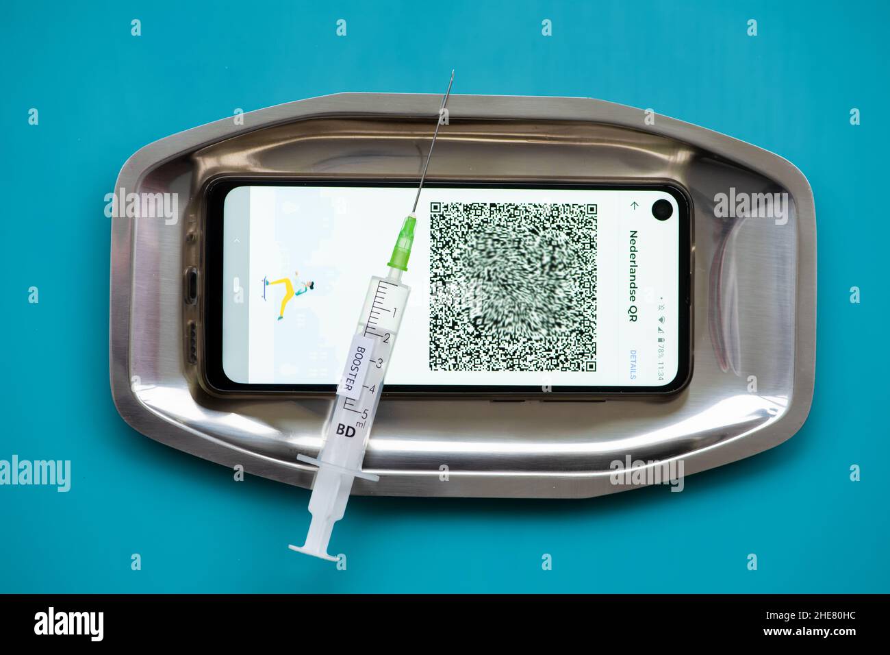 Booster vaccination and QR code Stock Photo - Alamy