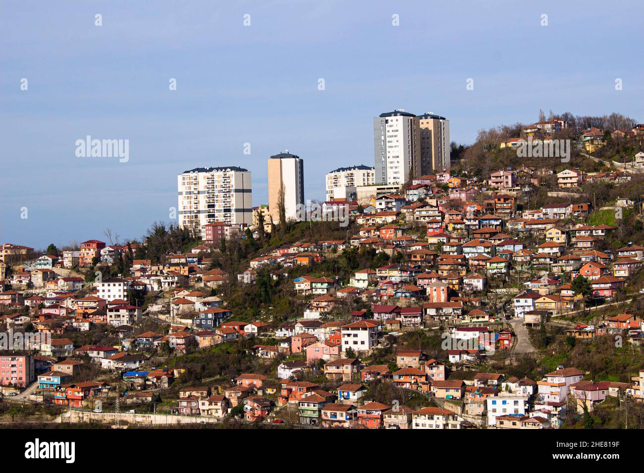 Crooked urbanization. slums between big buildings Stock Photo