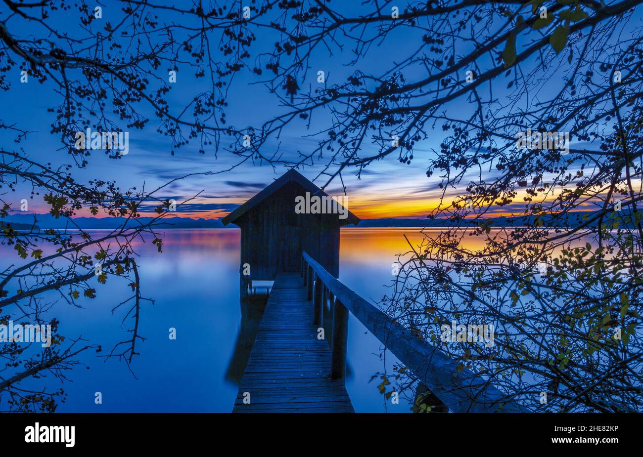 Boathouse at twilight on Ammersee, Bavaria, Germany Stock Photo