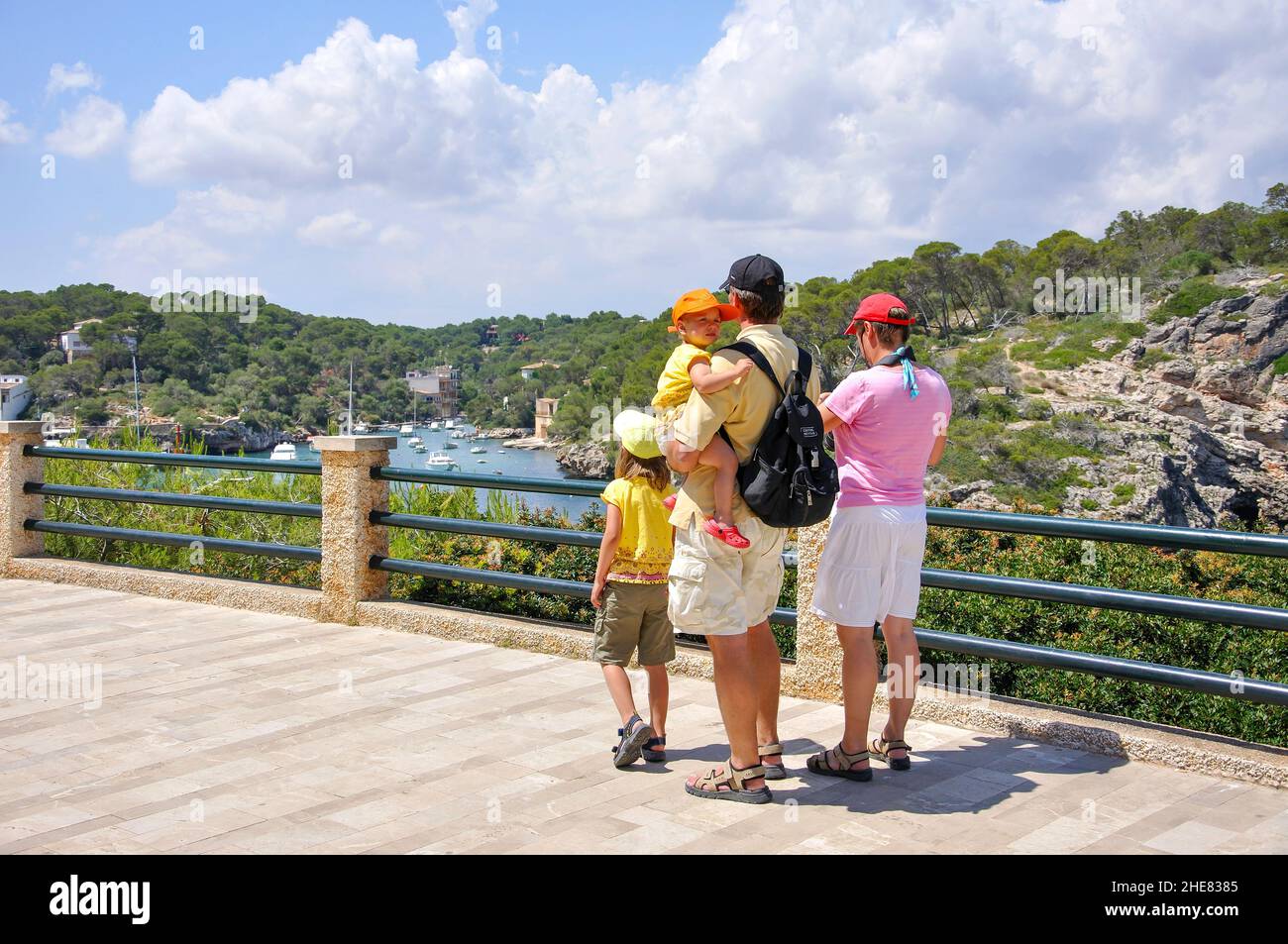 Family walking by harbour, Cala Figuera, Santanyi Municipality, Majorca (Mallorca), Balearic Islands, Spain Stock Photo