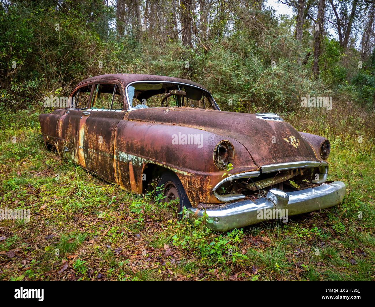 Old rusted abandoned cars in Crawfordville Florida Stock Photo