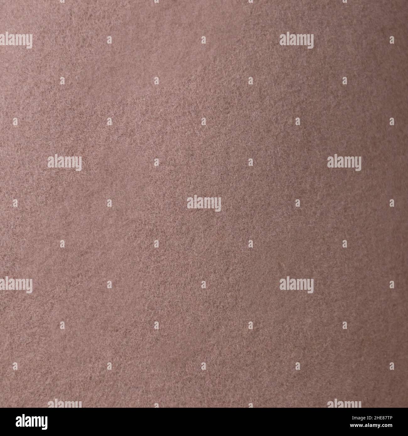 Fragment of synthetic dense and smooth very dark brown material Stock Photo