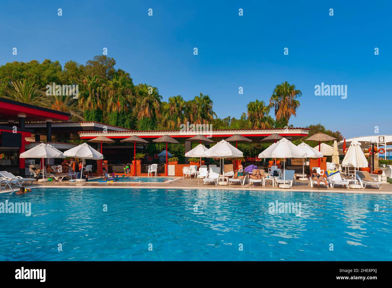 Hotel Pool And Guests At Lara Beach, Antalya, Turkey Stock Photo