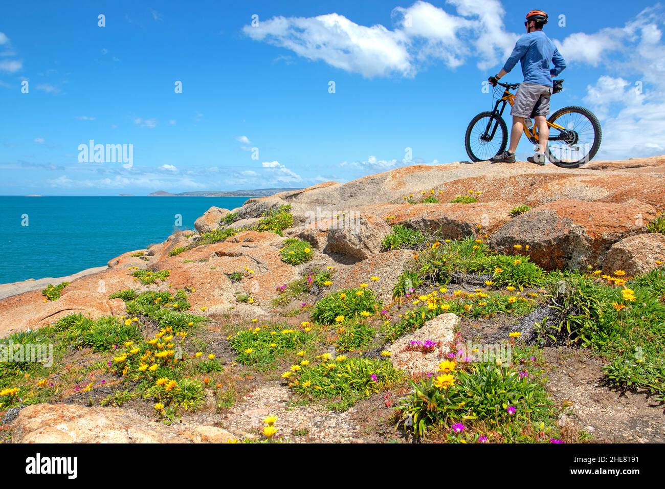 Cyclist on the Encounter Bikeway along the south coast of the Fleurieu Peninsula Stock Photo