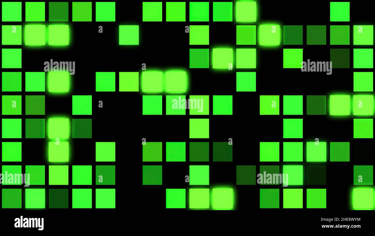 Green motion abstract background with colorful pixels flashing and switching on black background, seamless loop. Green glowing mosaic tiles in paralle Stock Photo