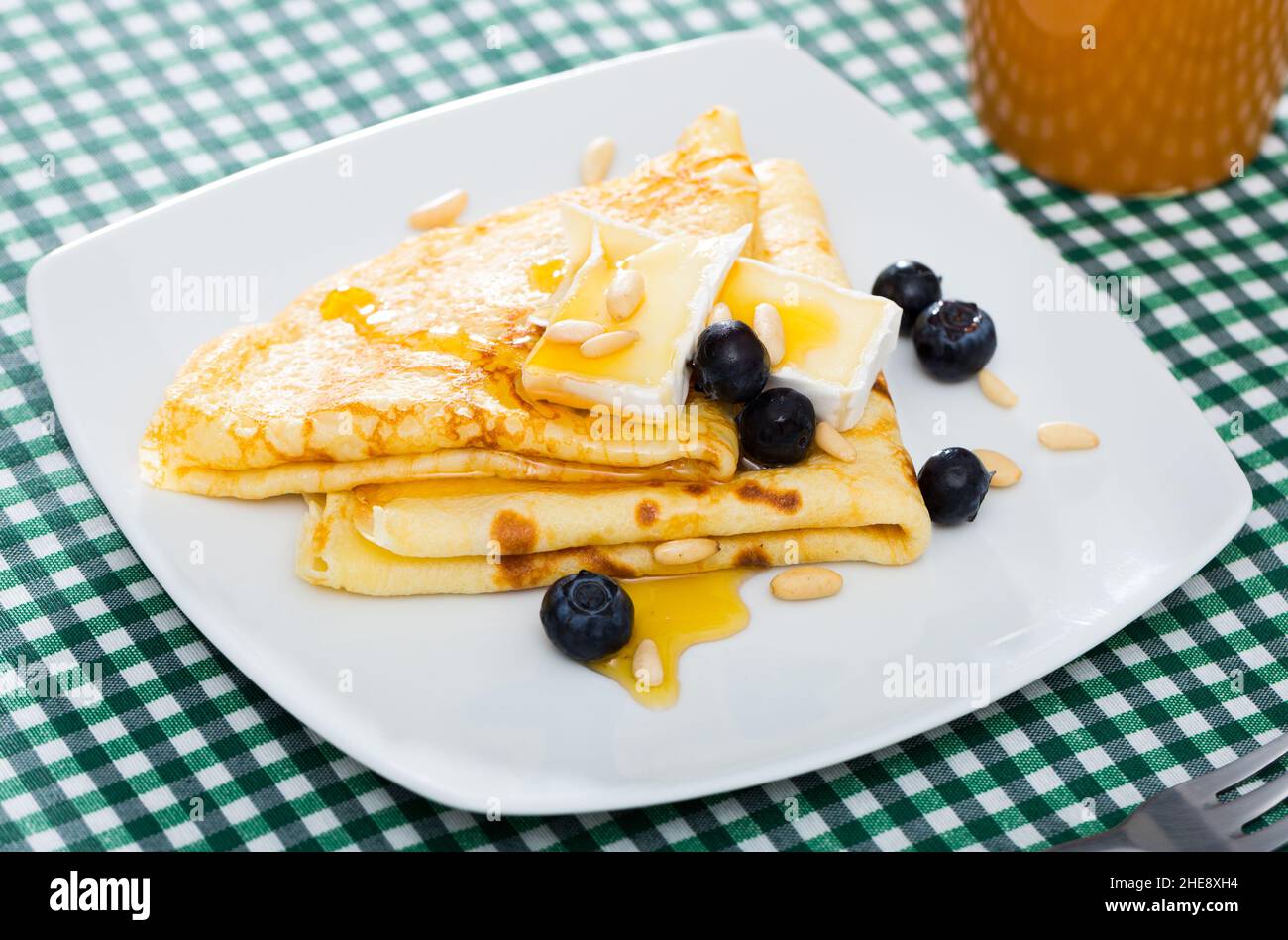 crepes-with-brie-and-honey-stock-photo-alamy