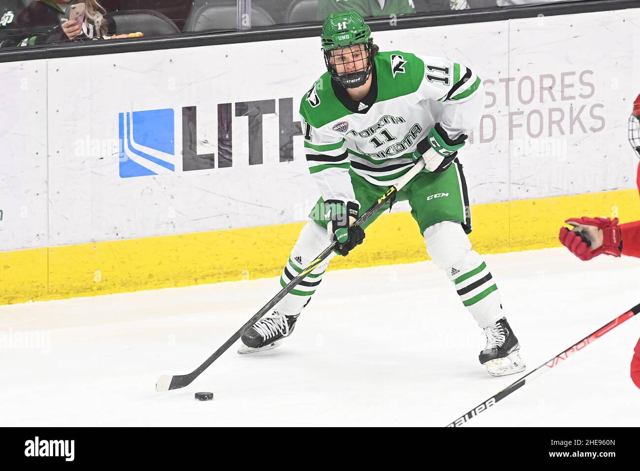North Dakota Fighting Hawks forward Griffin Ness (11) skates with the puck during a NCAA men's hockey game between the Cornell University Big Red and the University of North Dakota Fighting Hawks at Ralph Engelstad Arena, Grand Forks, ND on Saturday, January 8, 2022. Cornell wins 3-1. By Russell Hons/CSM Stock Photo