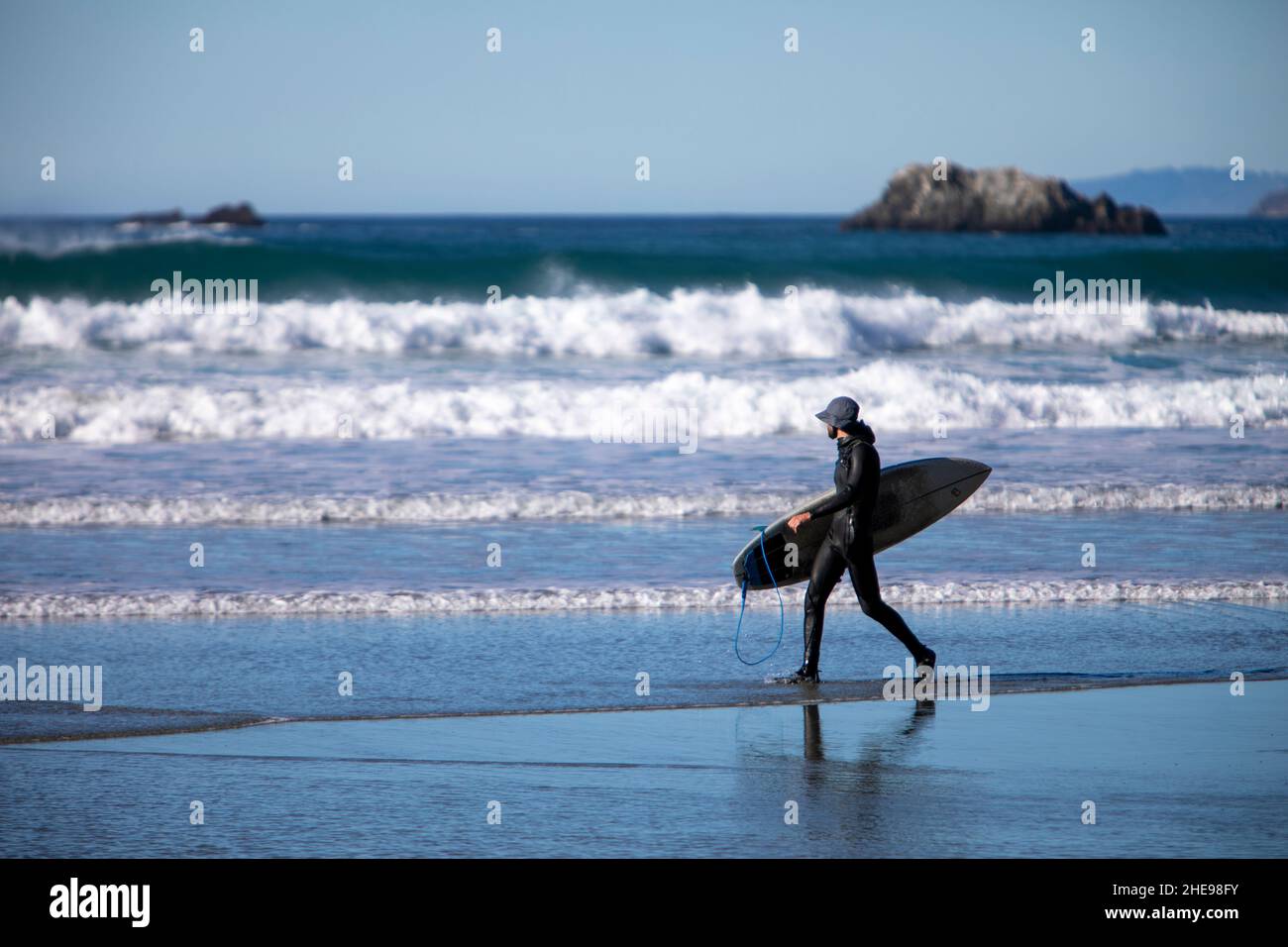 Surfer at Sand Dollar beach, southern Big Sur coast, Highway 1, California Stock Photo