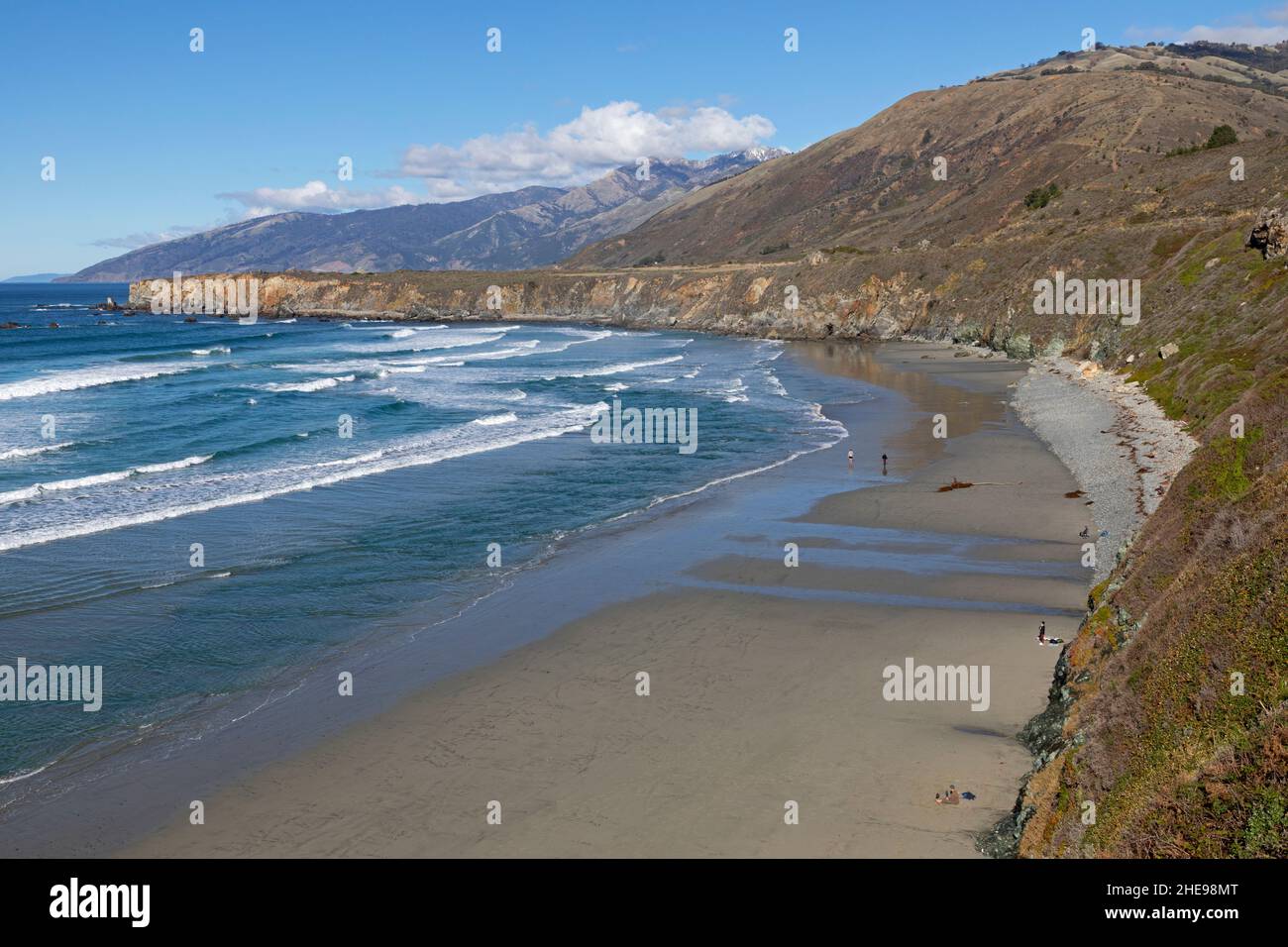 Sand Dollar Beach along Highway 1 in Southern Part of Big Sur coast with snow on local mountain Stock Photo