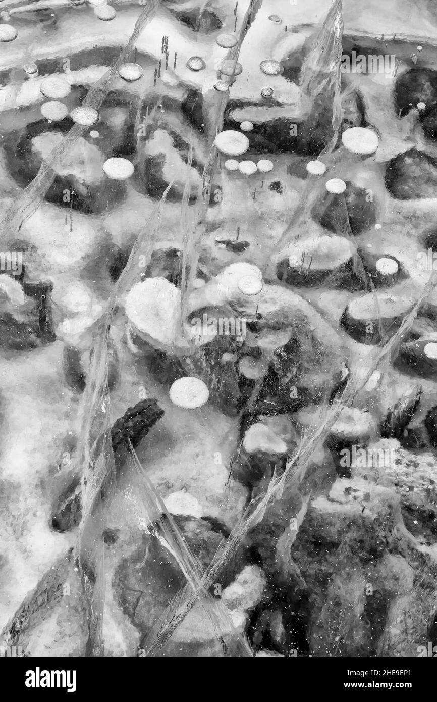 Canada, Alberta, Canmore, Spray Valley Provincial Park, Close-up ice and rock abstract (bw) Stock Photo