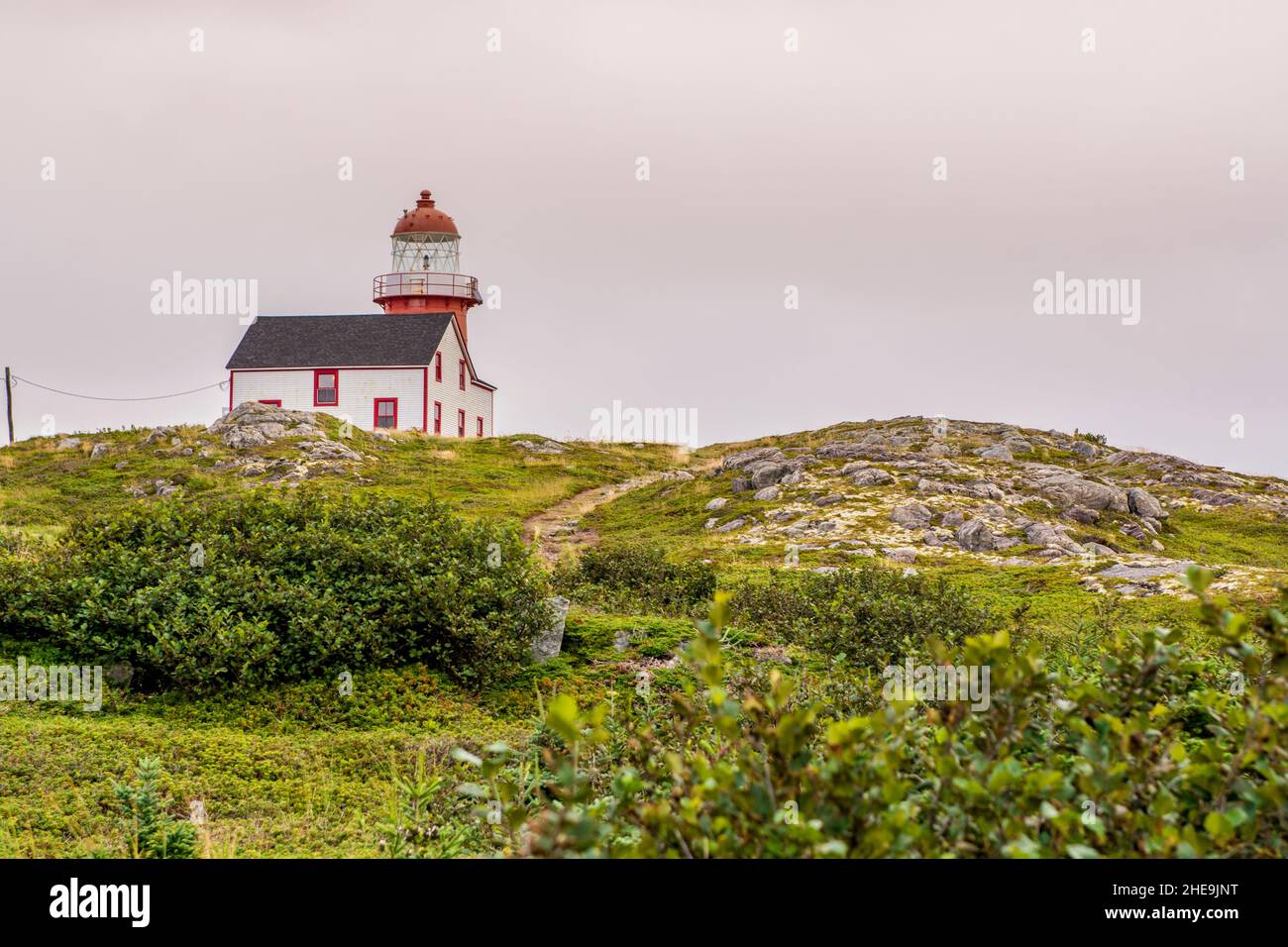 Red Ferryland Head Lighthouse, Ferryland, Newfoundland, Canada. Stock Photo