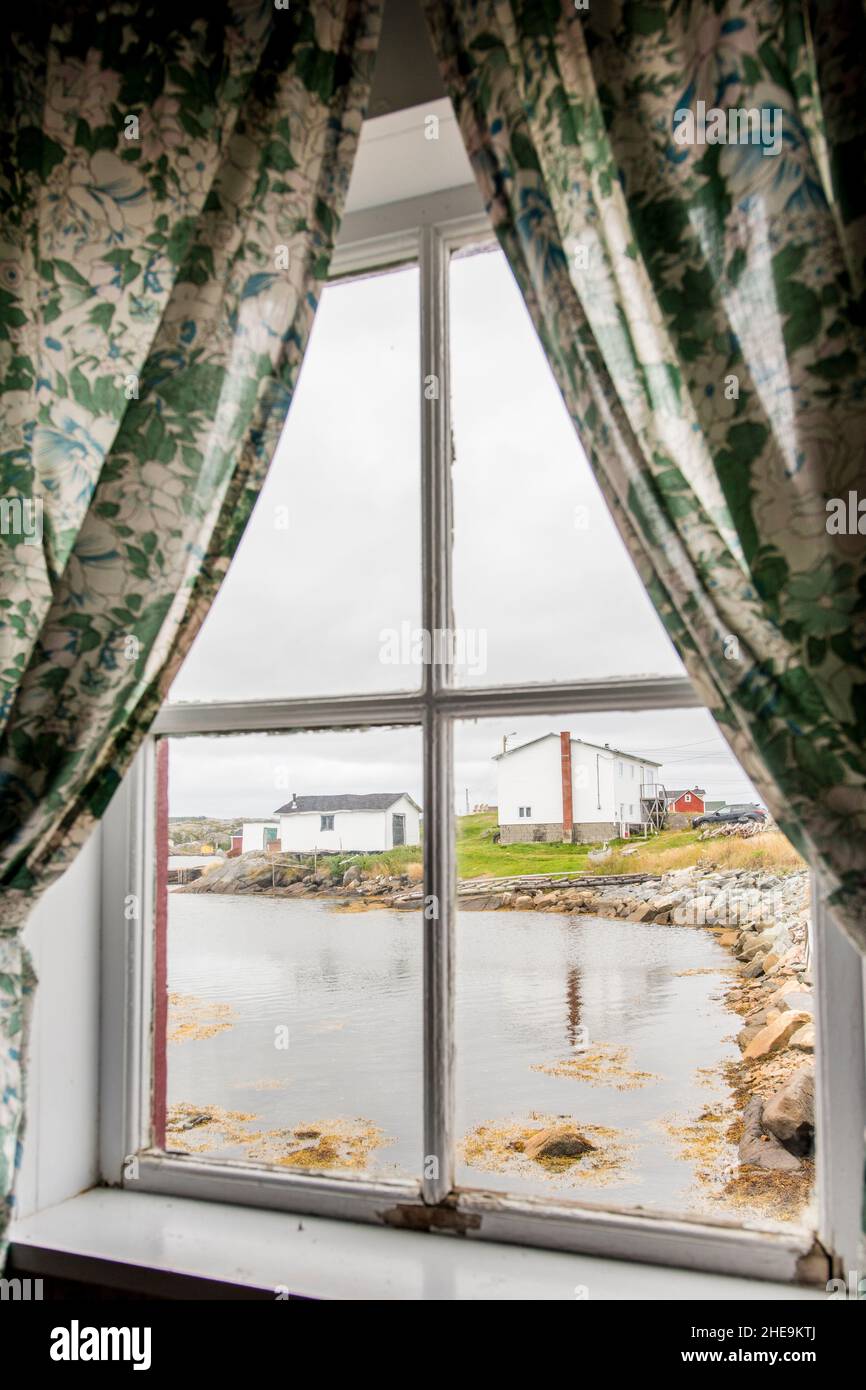 View through window in Joe Batt's Arm, Fogo Island, Newfoundland, Canada.. Stock Photo
