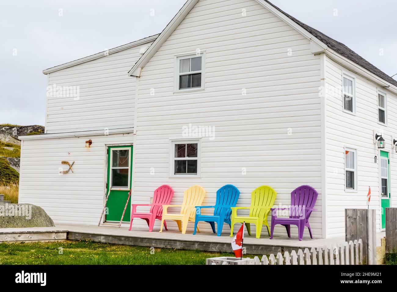 Colorful chairs on porch of house in Joe Batt's Arm, Fogo Island