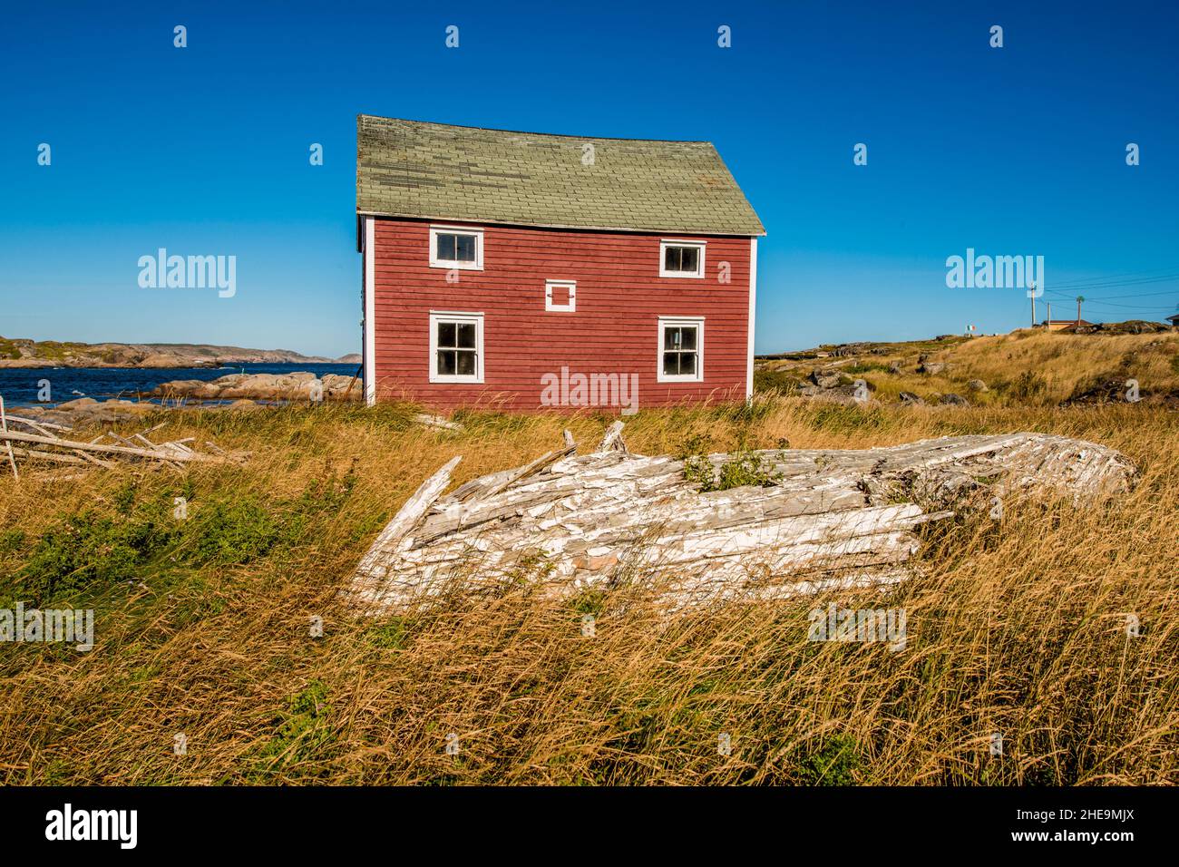 Boathouse and rotting boat in Joe Batt's Arm, Fogo Island, Newfoundland, Canada. Stock Photo