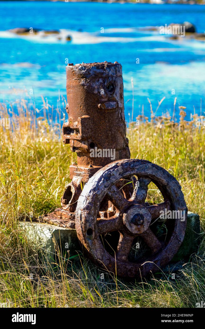 Old machinery pump in Joe Batt's Arm, Fogo Island, Newfoundland, Canada. Stock Photo