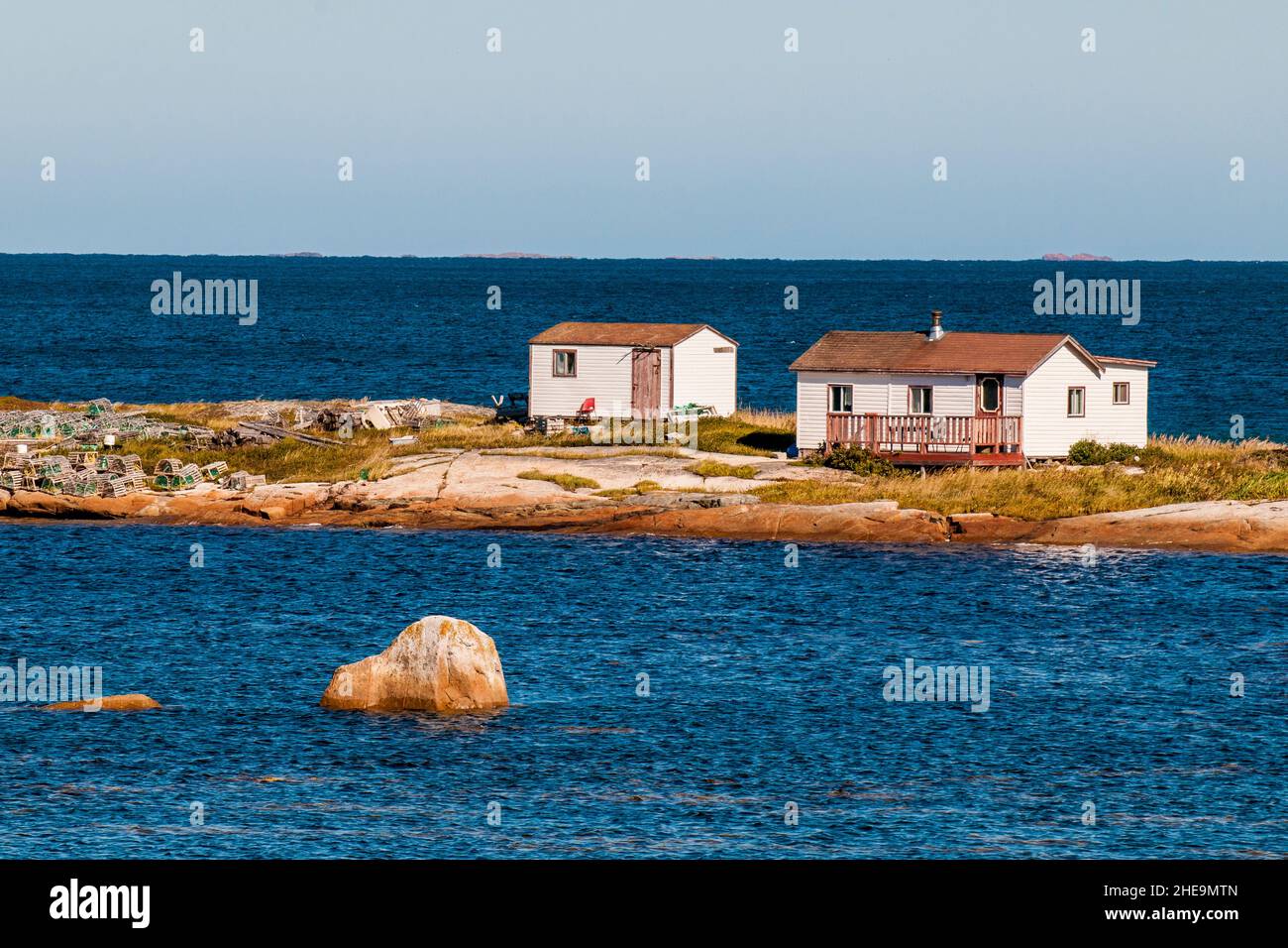 Houses in Shoal Bay coastline, Fogo Island, Newfoundland, Canada. Stock Photo