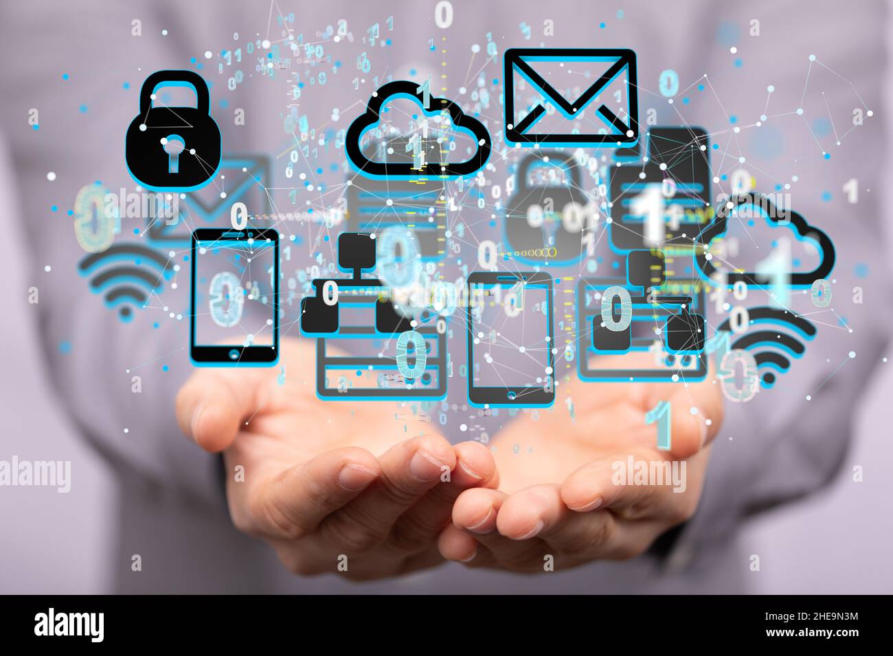Shallow focus of human hands holding various mobile icons, Internet ...