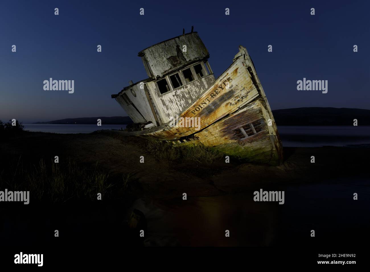 The S.S. Point Reyes shipwreck illuminated in the blue hour. Inverness, Point Reyes National Seashore, California, USA. Stock Photo