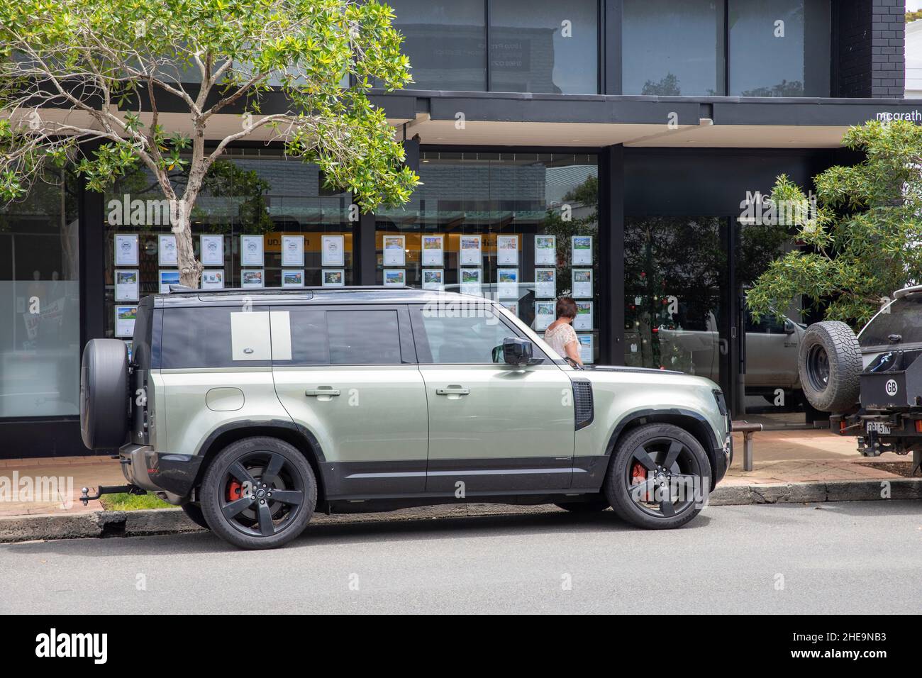 Land Rover defender 110 Pangea Green parked in a Sydney street, January 2022,Australia Stock Photo