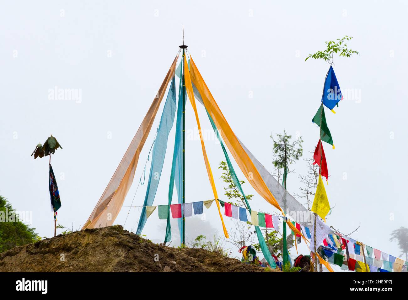 Prayer flags in Dochula Pass in the Himalayas, Bhutan Stock Photo