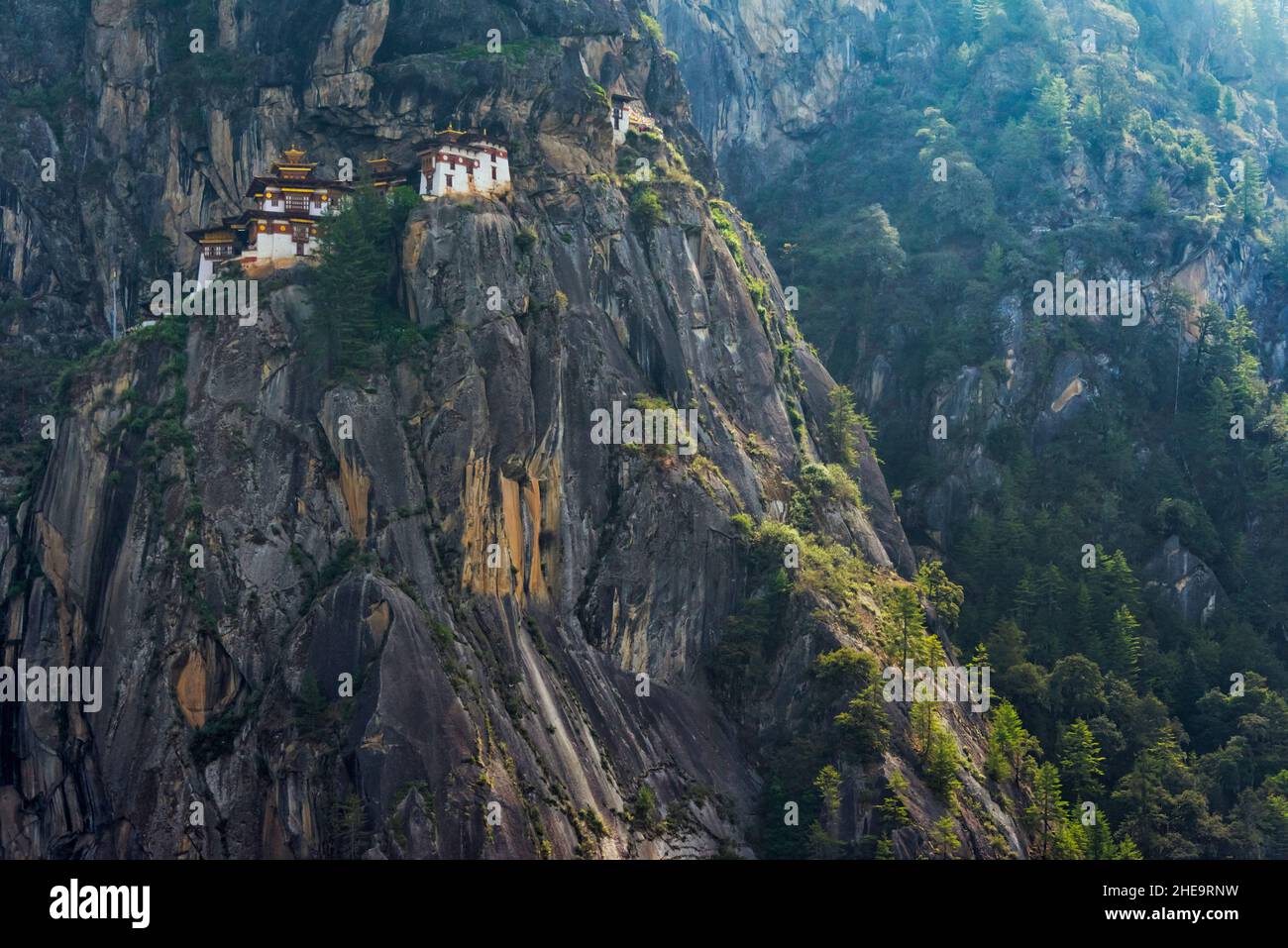 Paro Taktsang (also known as Tiger's Nest) perched on the cliff, Paro, Bhutan Stock Photo