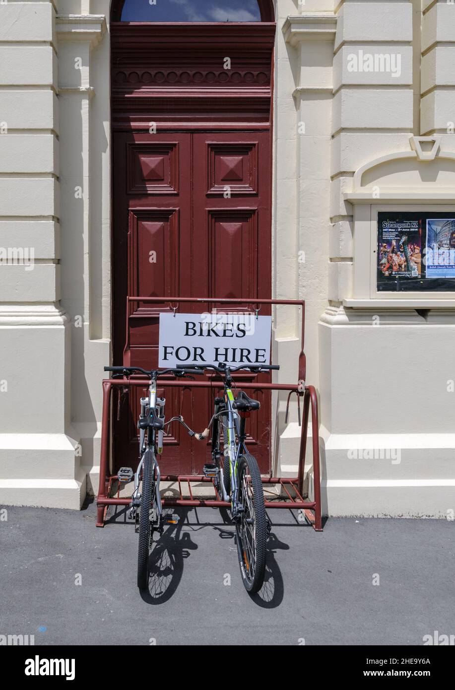 Bikes for hire by the tourist information in Oamaru New Zealand Stock Photo