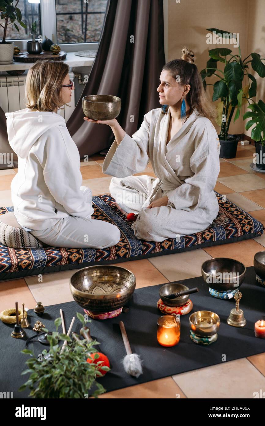 Sound healing with singing bowls, vibration massage and alternative