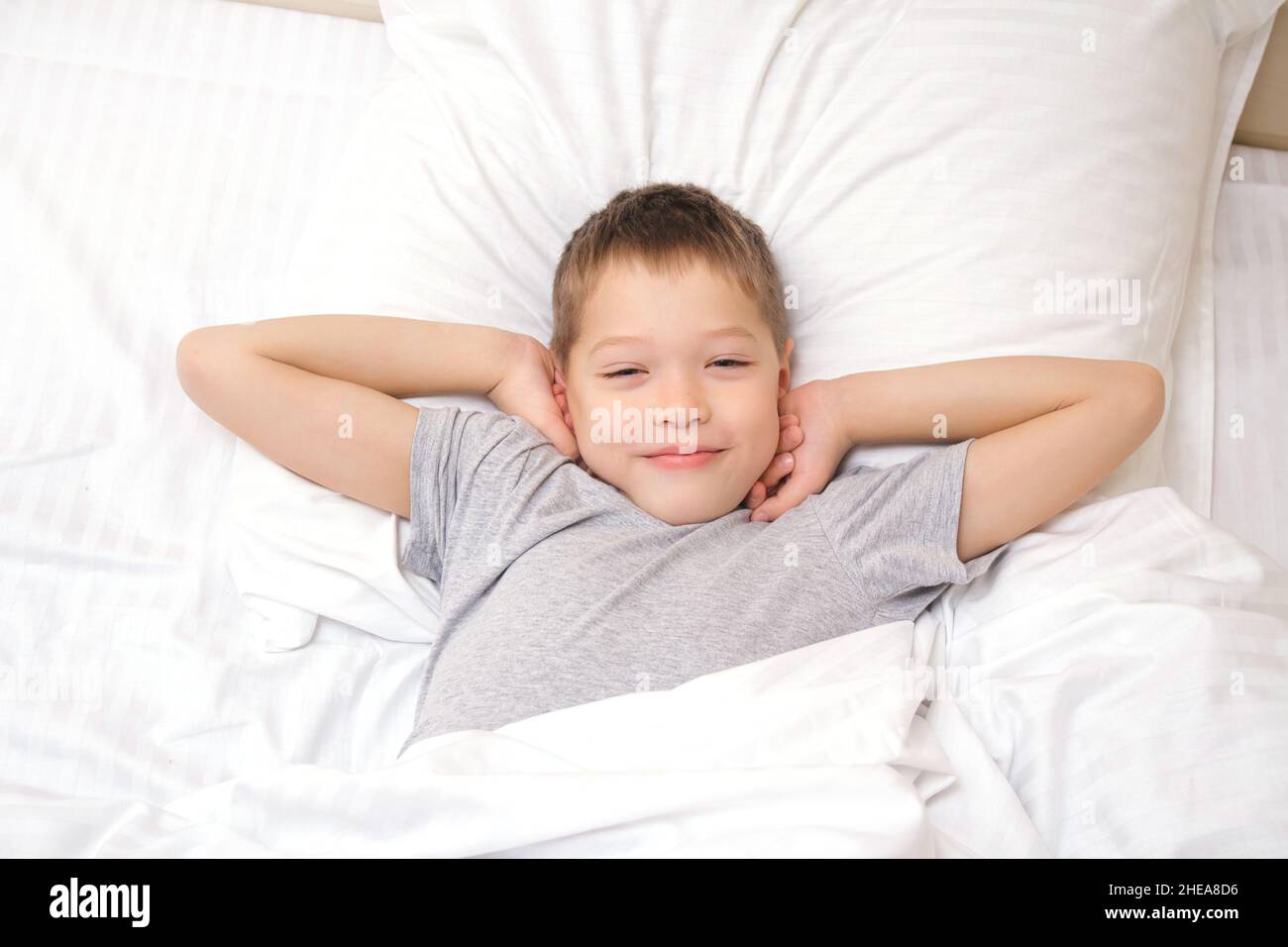 Child waking up alarm hi-res stock photography and images - Alamy